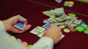 stock-footage-dealer-dealing-cards-for-high-stakes-poker-game-in-casino